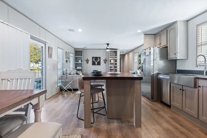 The RESOLUTION 16763J Kitchen. This Manufactured Mobile Home features 3 bedrooms and 2 baths.