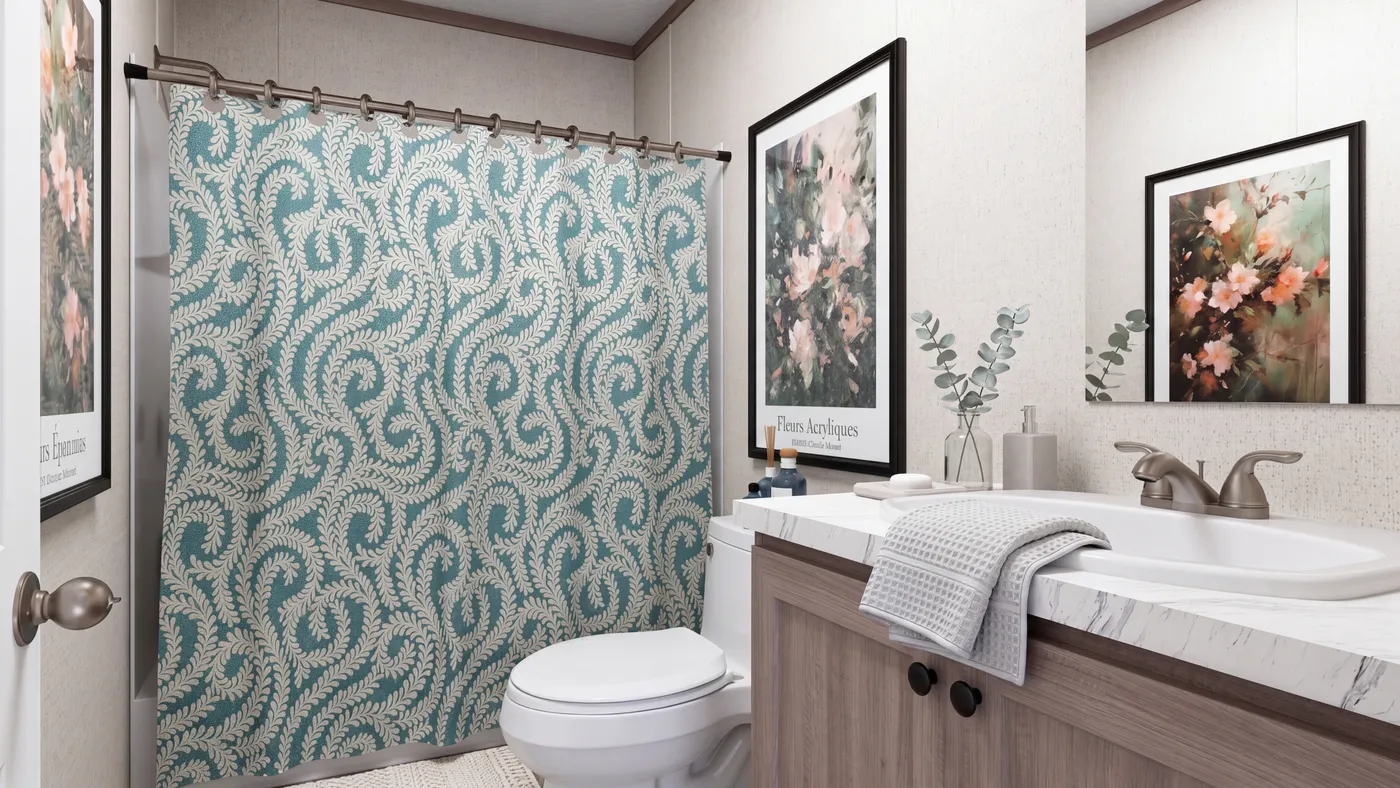 The THE MOUNTAINEER 60 Guest Bathroom. This Manufactured Mobile Home features 3 bedrooms and 2 baths.