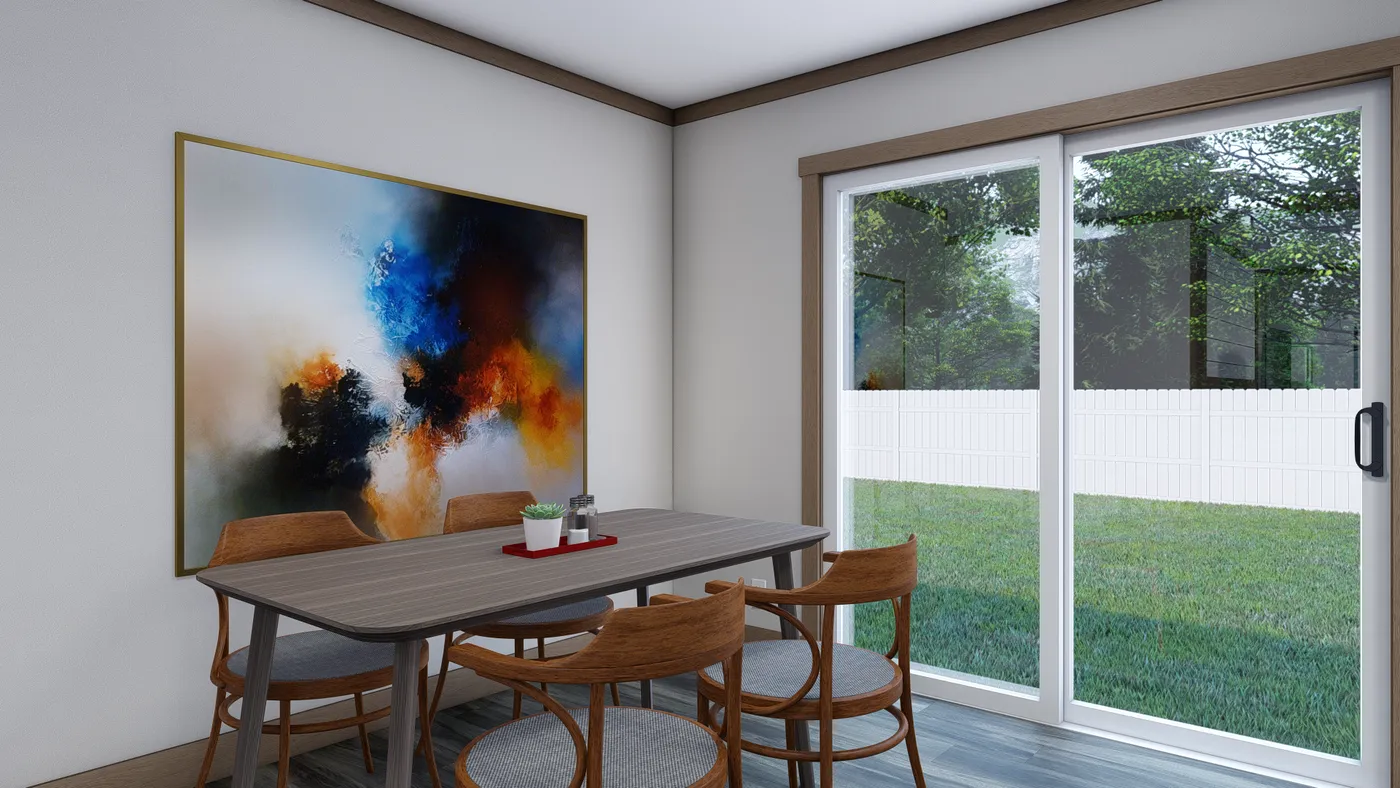 The EMILIE Dining Room. This Manufactured Mobile Home features 3 bedrooms and 2 baths.