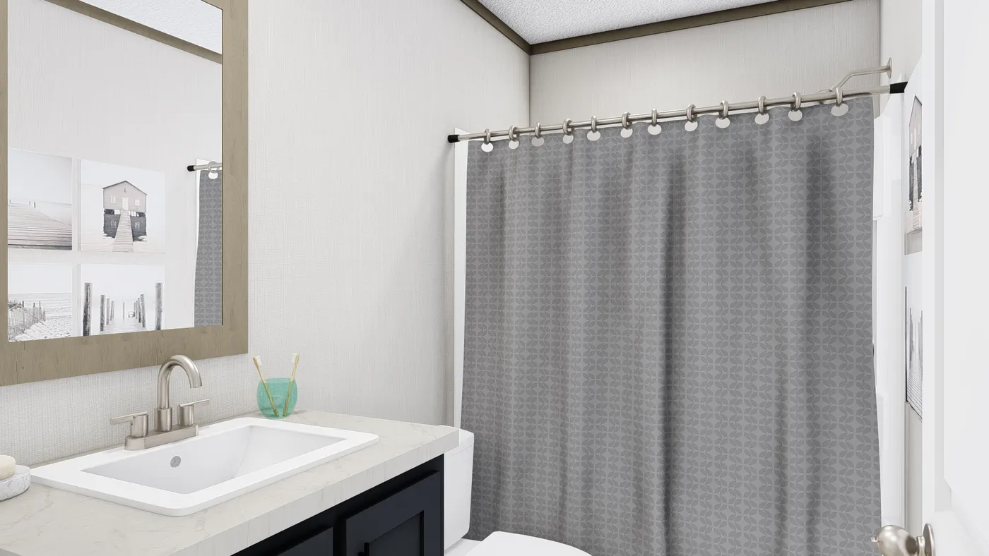 The BOONE Guest Bathroom. This Manufactured Mobile Home features 4 bedrooms and 2 baths.