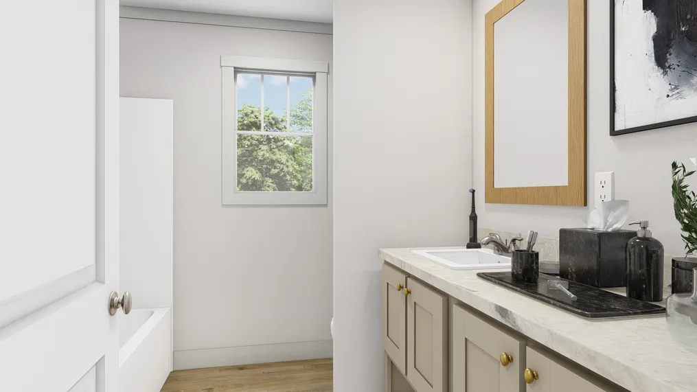 The BROWN EYED GIRL/6028-42-2 SECT Guest Bathroom. This Manufactured Mobile Home features 4 bedrooms and 2 baths.