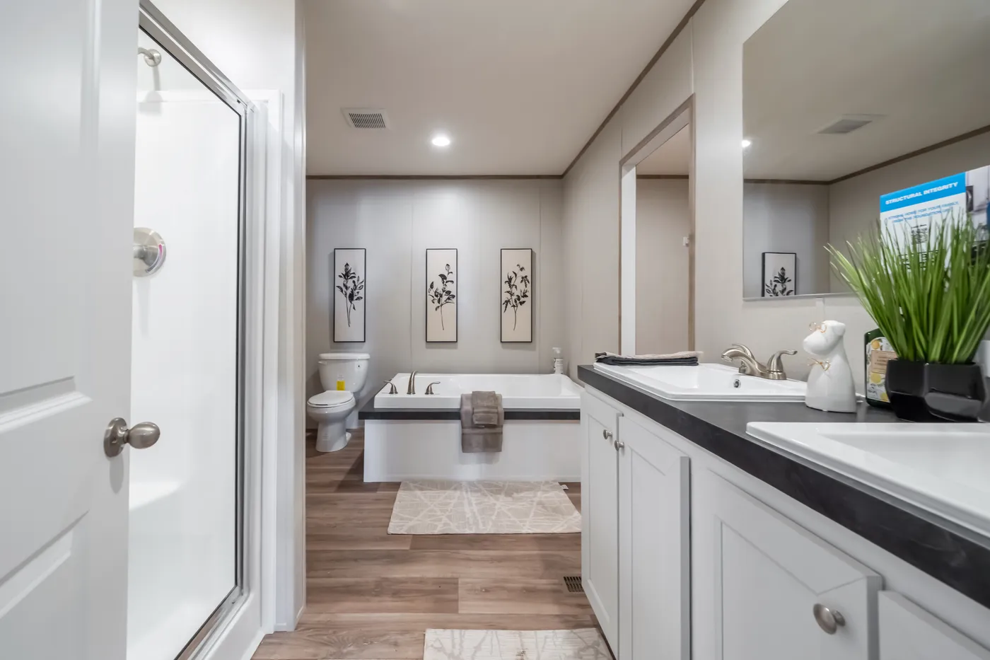 The ECLIPSE Primary Bathroom. This Manufactured Mobile Home features 4 bedrooms and 2 baths.