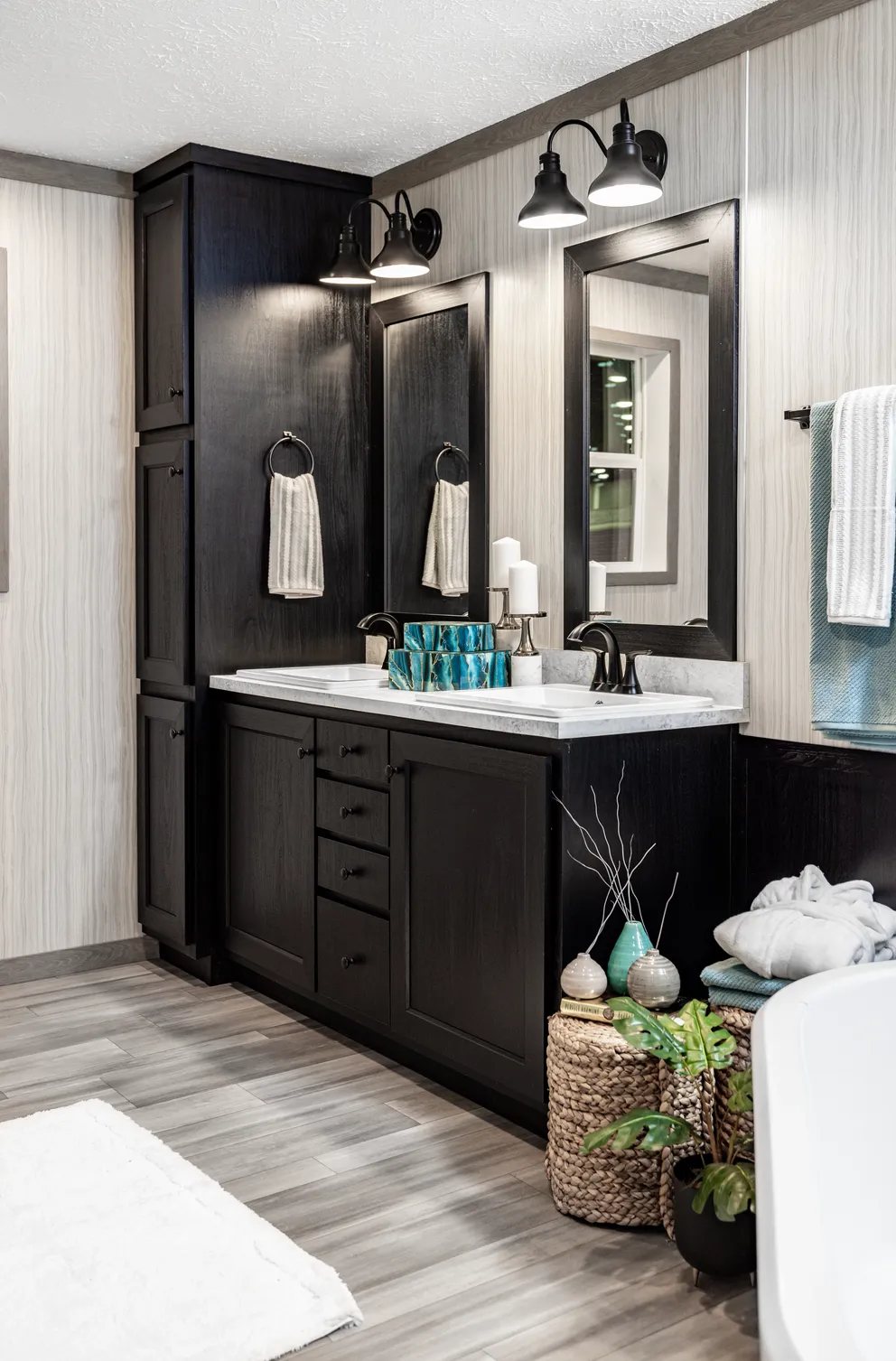 The 6428-E792 THE PULSE Primary Bathroom. This Manufactured Mobile Home features 3 bedrooms and 2.5 baths.