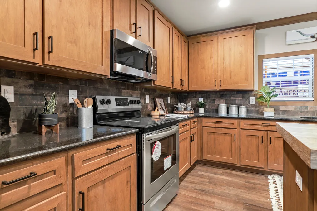 The THE DURANGO Kitchen. This Manufactured Mobile Home features 3 bedrooms and 2 baths.
