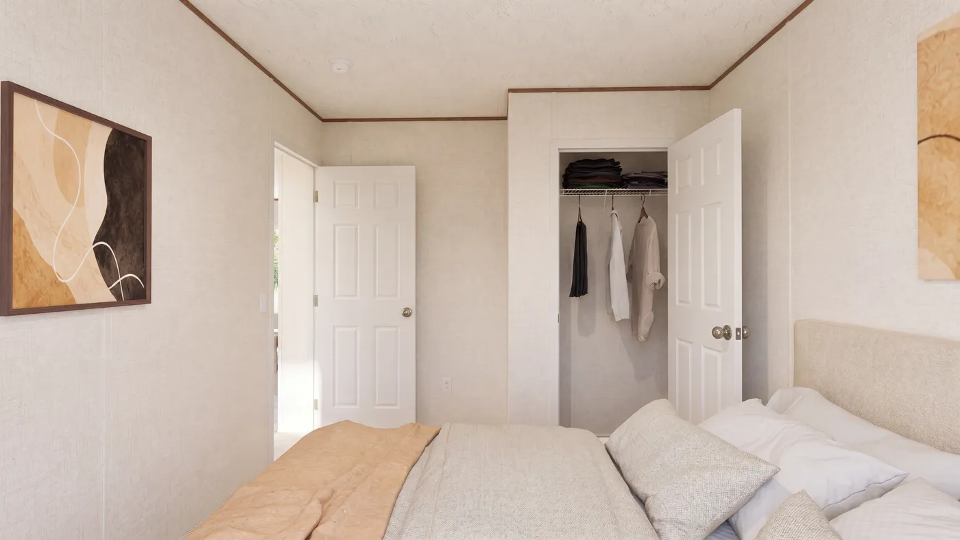 The OAK Bedroom. This Manufactured Mobile Home features 4 bedrooms and 2 baths.