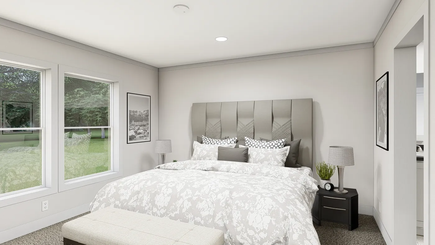 The LEAN ON ME Primary Bedroom. This Manufactured Mobile Home features 3 bedrooms and 2 baths.