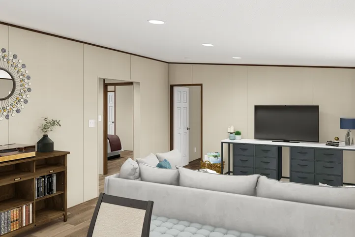 The PRIDE Family Room. This Manufactured Mobile Home features 4 bedrooms and 2 baths.