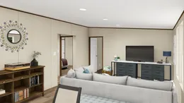The PRIDE Family Room. This Manufactured Mobile Home features 4 bedrooms and 2 baths.