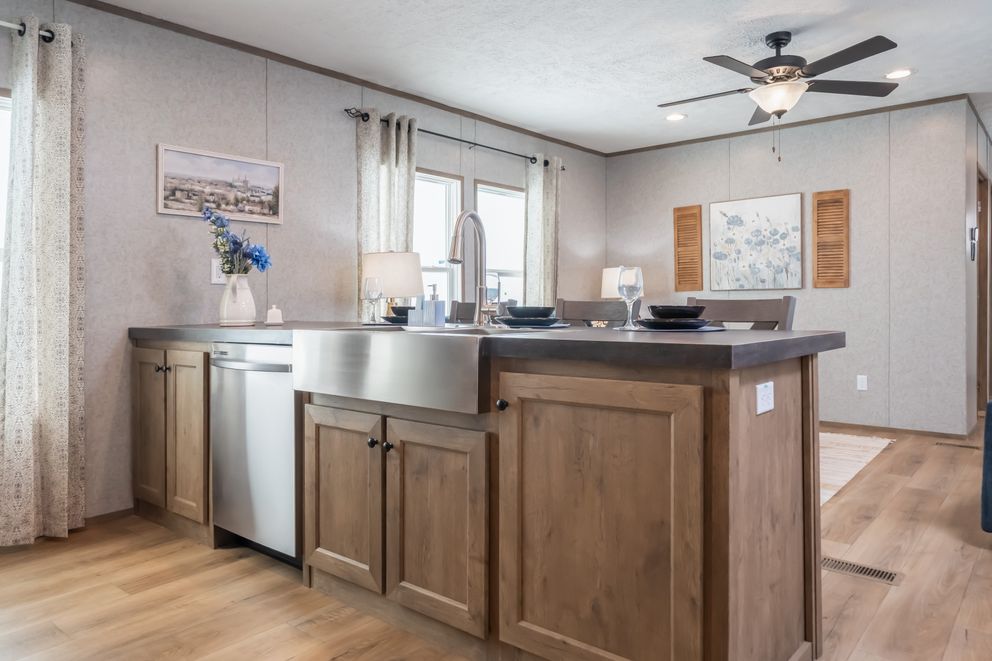 The WARRIOR II Kitchen. This Manufactured Mobile Home features 2 bedrooms and 2 baths.