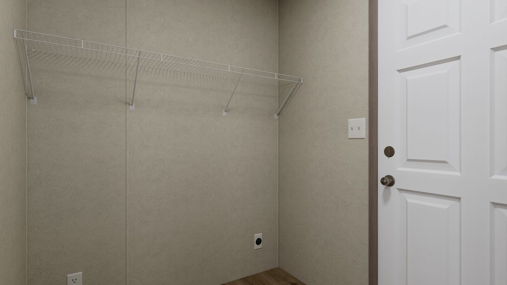 The 5614-CC02 CLEARPATH 56 Utility Room. This Manufactured Mobile Home features 2 bedrooms and 2 baths.