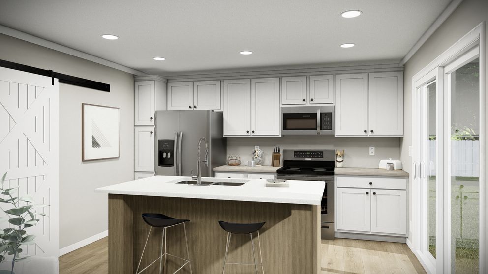 The THE WASHINGTON Kitchen. This Manufactured Mobile Home features 3 bedrooms and 2 baths.