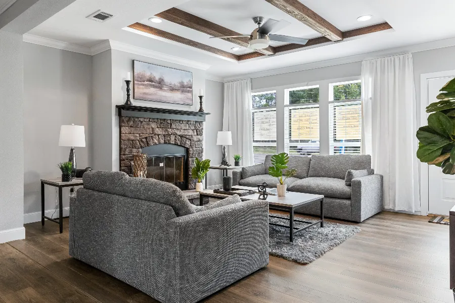 The THE SEDONA 4 Living Room. This Manufactured Mobile Home features 4 bedrooms and 2 baths.