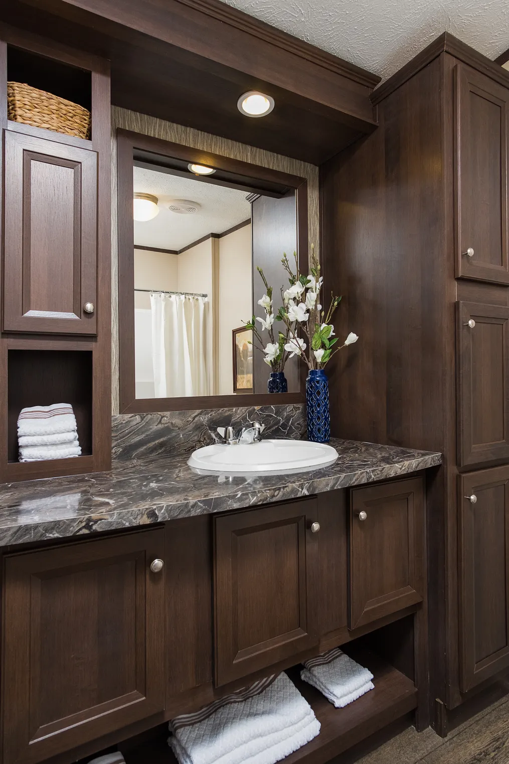 The ADIRONDACK 3628-236 Primary Bathroom. This Manufactured Mobile Home features 2 bedrooms and 1 bath.