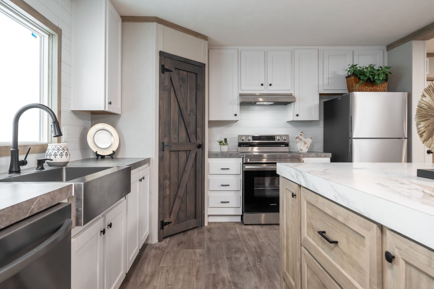 The PT 78 Kitchen. This Manufactured Mobile Home features 3 bedrooms and 2 baths.