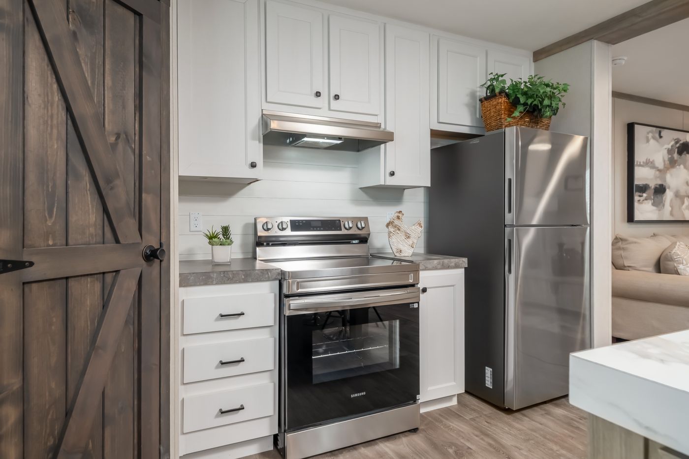 The PT 78 Kitchen. This Manufactured Mobile Home features 3 bedrooms and 2 baths.