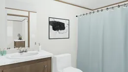 The SPECTACULAR Guest Bathroom. This Manufactured Mobile Home features 3 bedrooms and 2 baths.