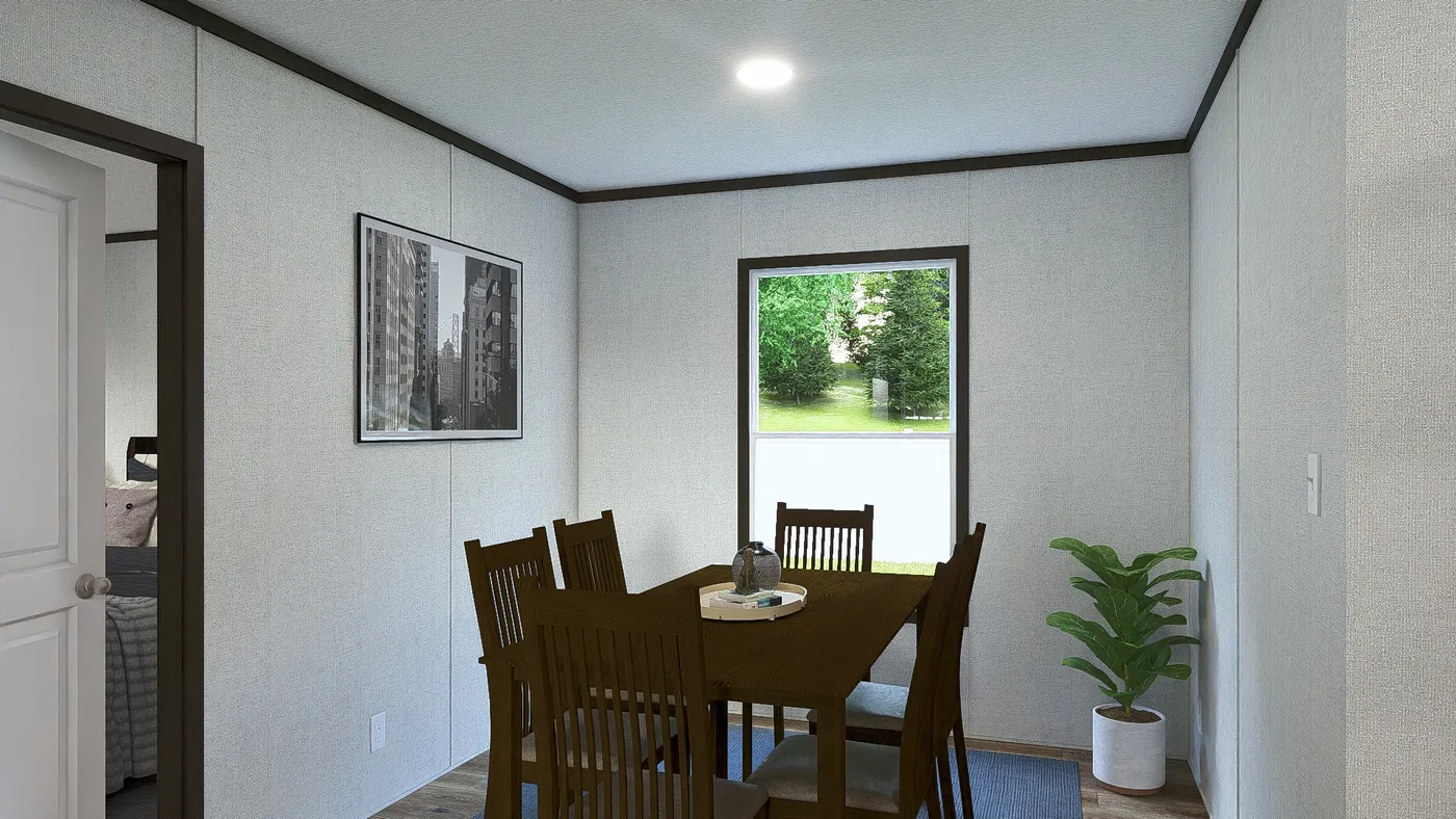 The GRAND Dining Room. This Manufactured Mobile Home features 3 bedrooms and 2 baths.