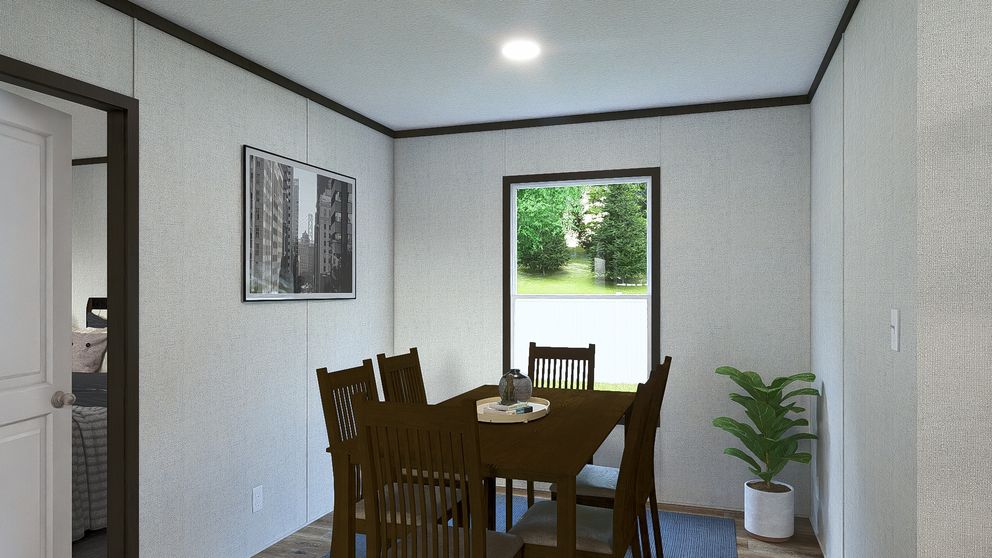 The GRAND Dining Room. This Manufactured Mobile Home features 3 bedrooms and 2 baths.
