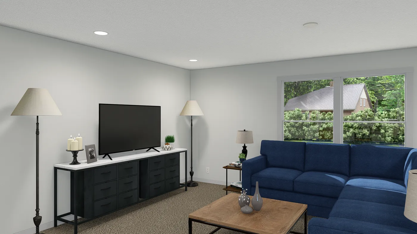 The ROCKET MAN Living Room. This Manufactured Mobile Home features 3 bedrooms and 2 baths.