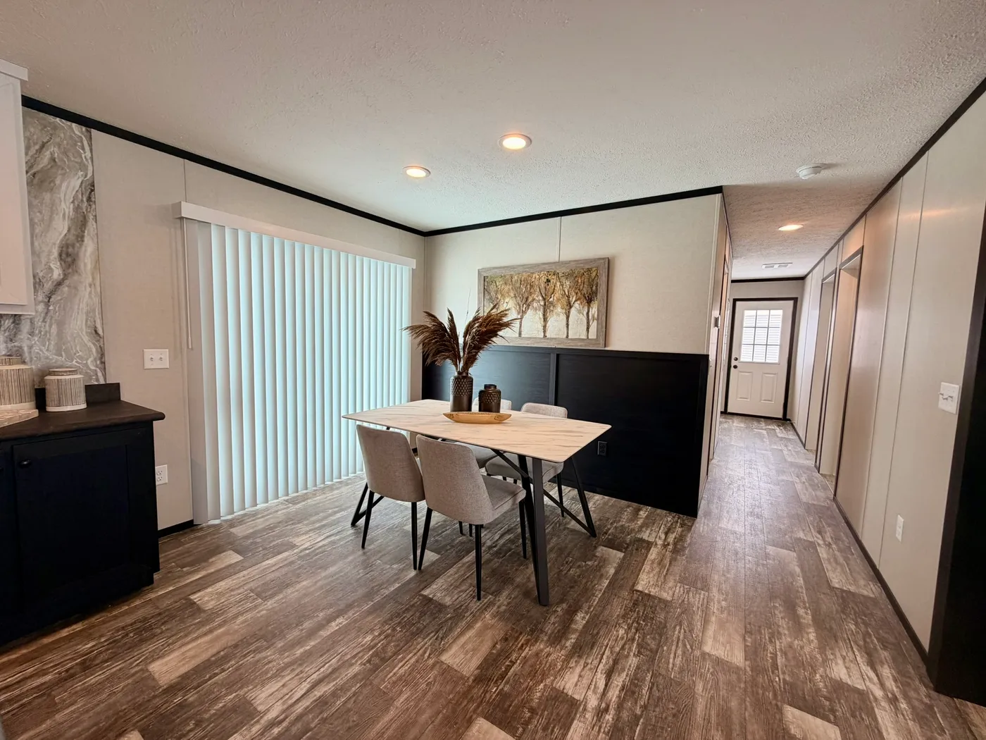 The DIAMOND Dining Area. This Manufactured Mobile Home features 3 bedrooms and 2 baths.