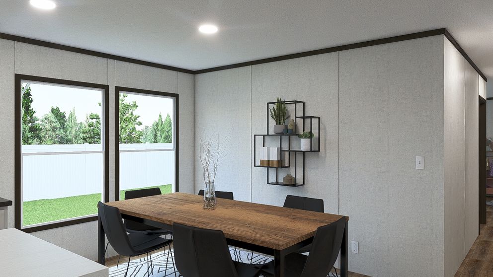 The EMPOWER Dining Room. This Manufactured Mobile Home features 4 bedrooms and 2 baths.