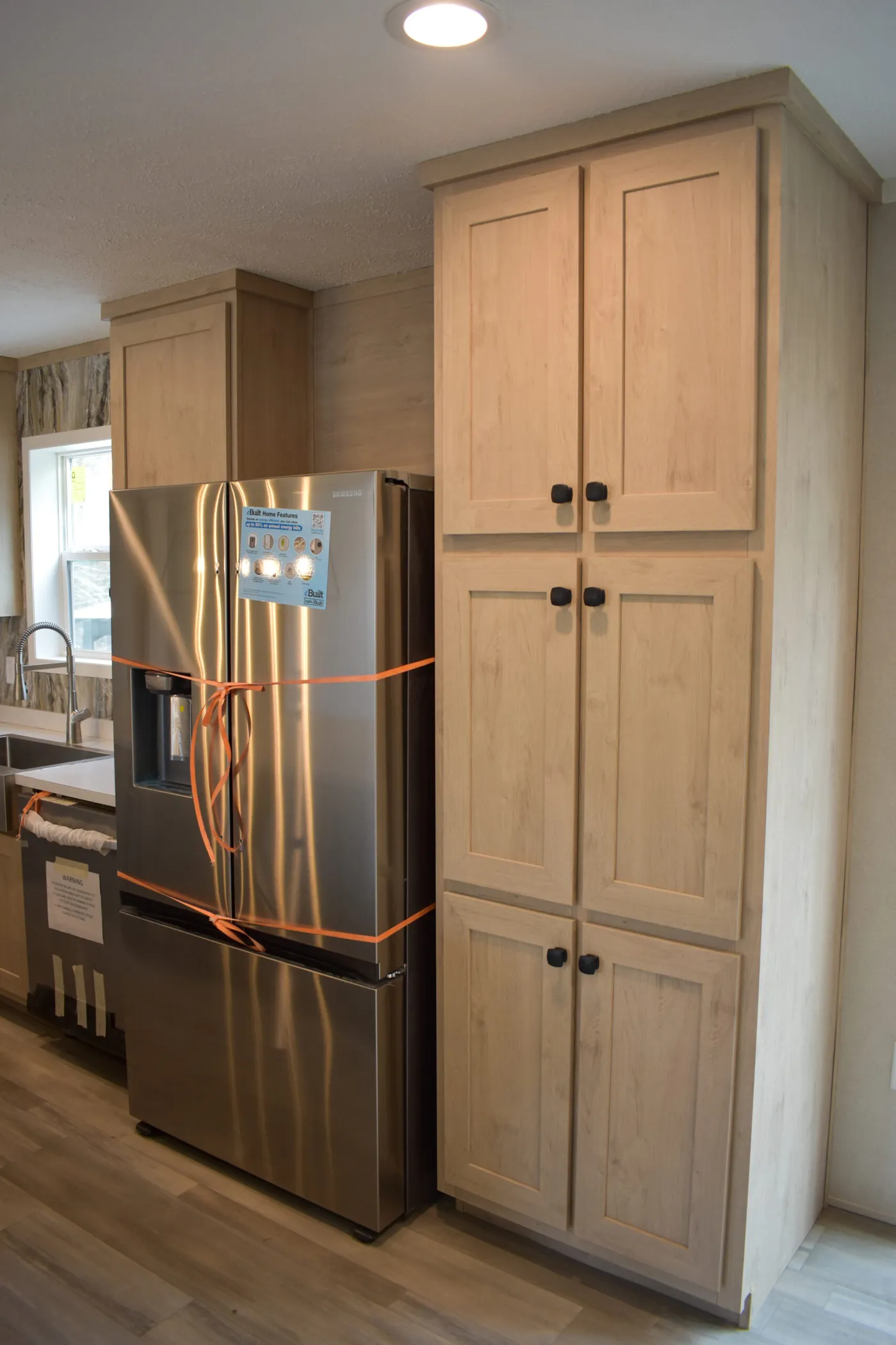 The MOONSTONE 60 Kitchen. This Manufactured Mobile Home features 3 bedrooms and 2 baths.
