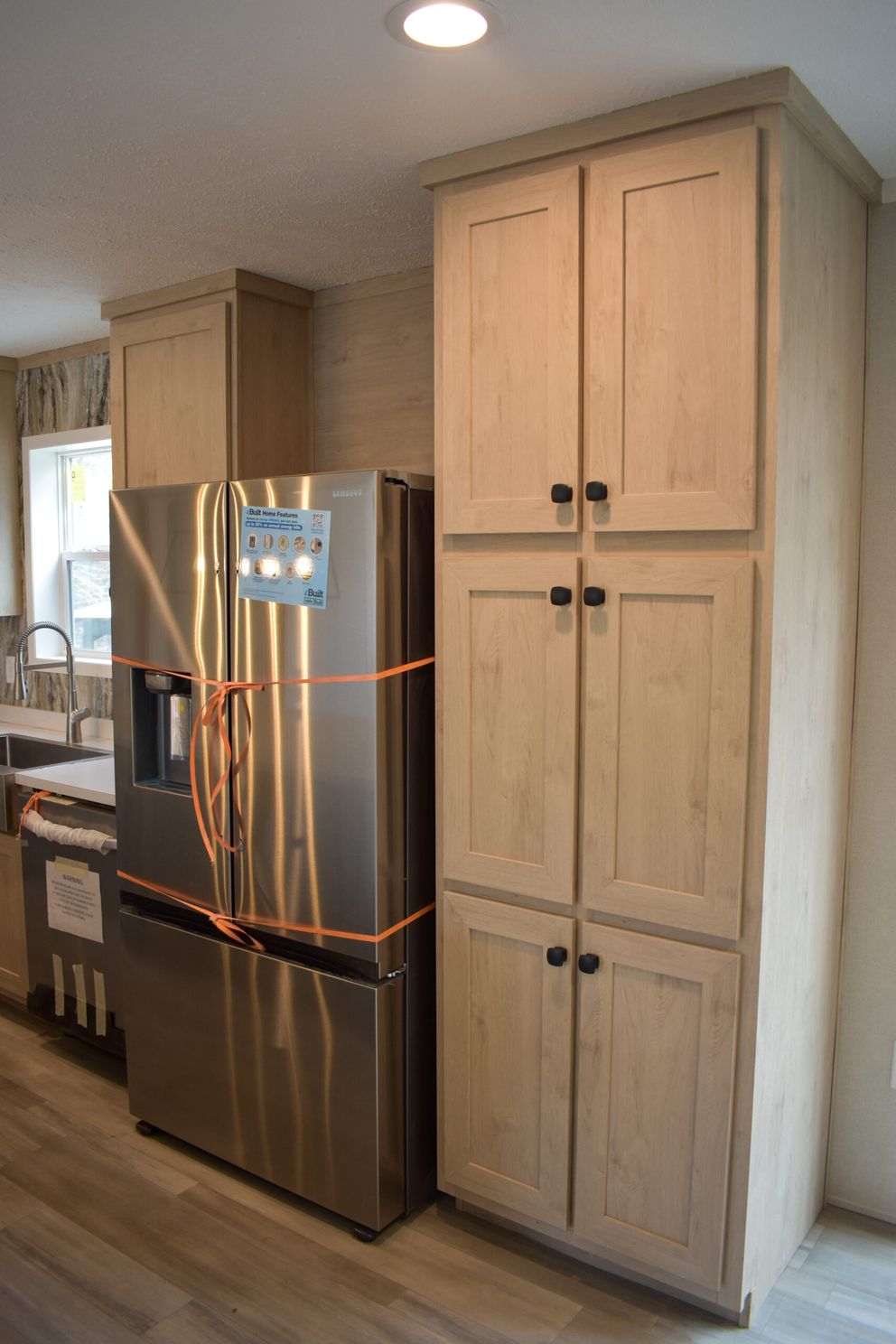 The MOONSTONE 60 Kitchen. This Manufactured Mobile Home features 3 bedrooms and 2 baths.