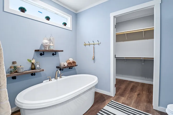 The THE VAIL Primary Bathroom. This Manufactured Mobile Home features 3 bedrooms and 2 baths.