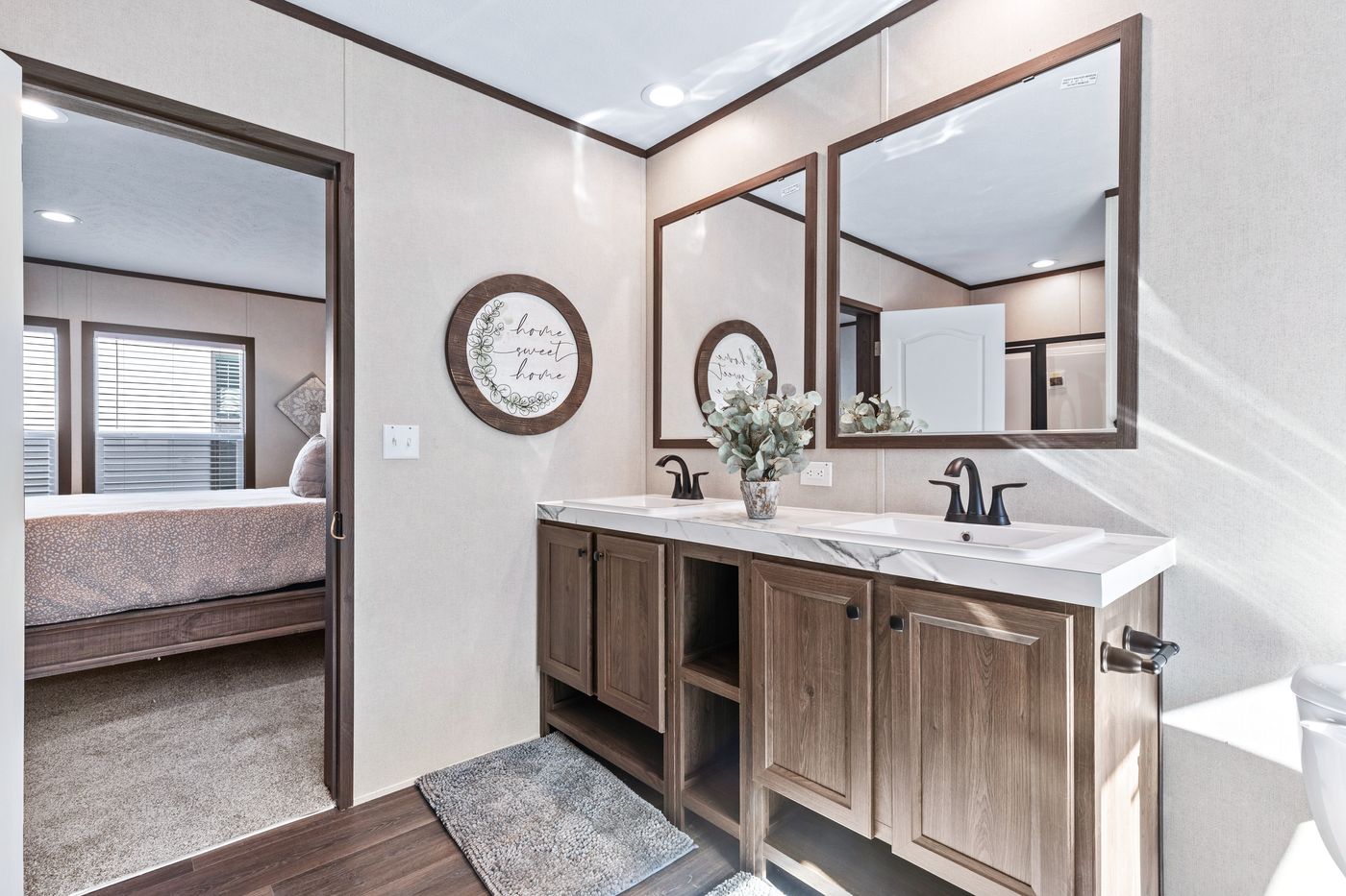 The THE RENEGADE Primary Bathroom. This Manufactured Mobile Home features 3 bedrooms and 2 baths.