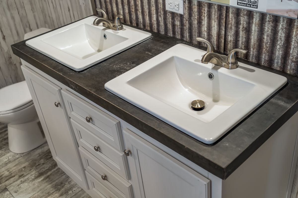 The ANNIVERSARY SPLASH Primary Bathroom. This Manufactured Mobile Home features 3 bedrooms and 2 baths.