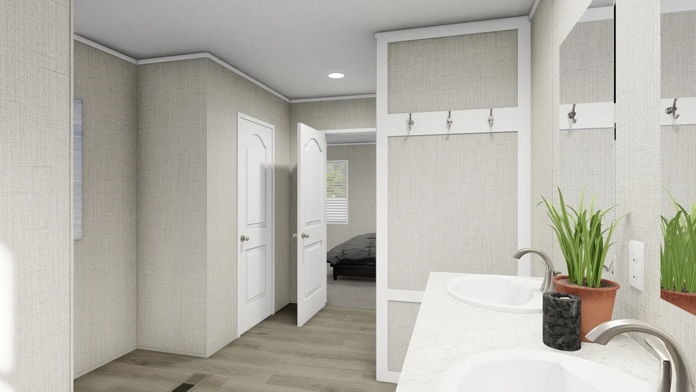 The COASTAL BREEZE II 28X56 Primary Bathroom. This Manufactured Mobile Home features 3 bedrooms and 2 baths.