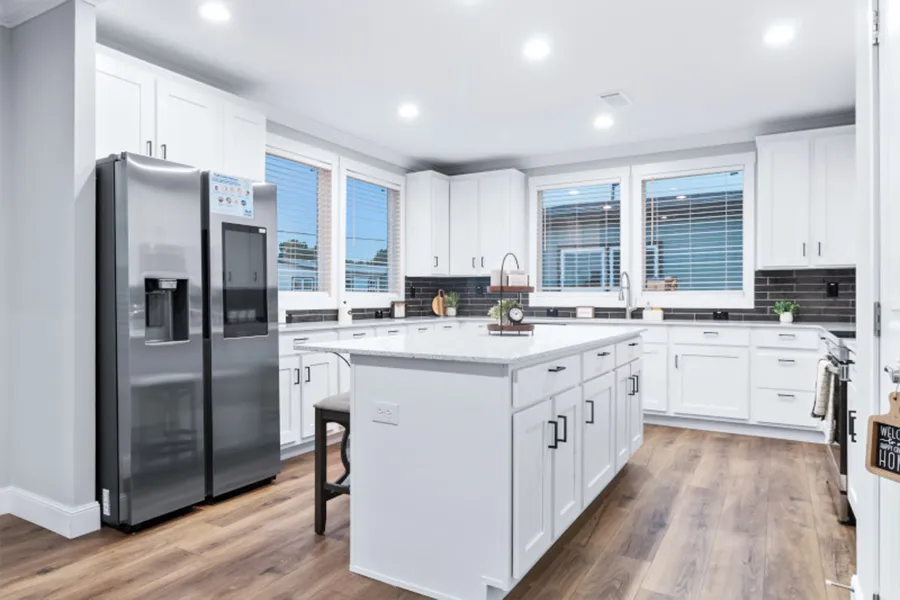 The THE OLYMPUS Kitchen. This Manufactured Mobile Home features 4 bedrooms and 3 baths.
