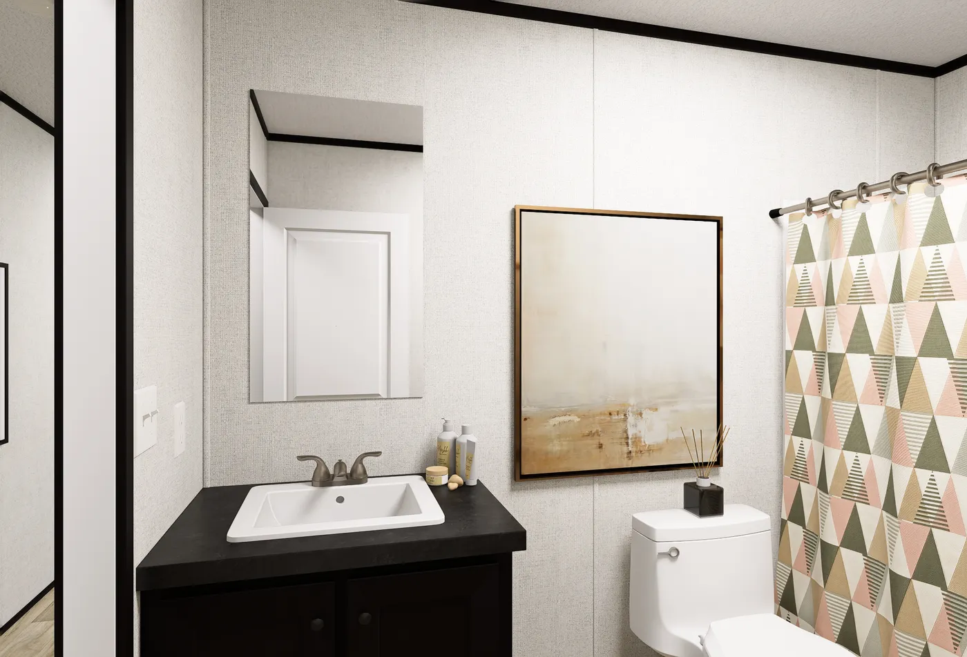 The ECLIPSE Guest Bathroom. This Manufactured Mobile Home features 4 bedrooms and 2 baths.
