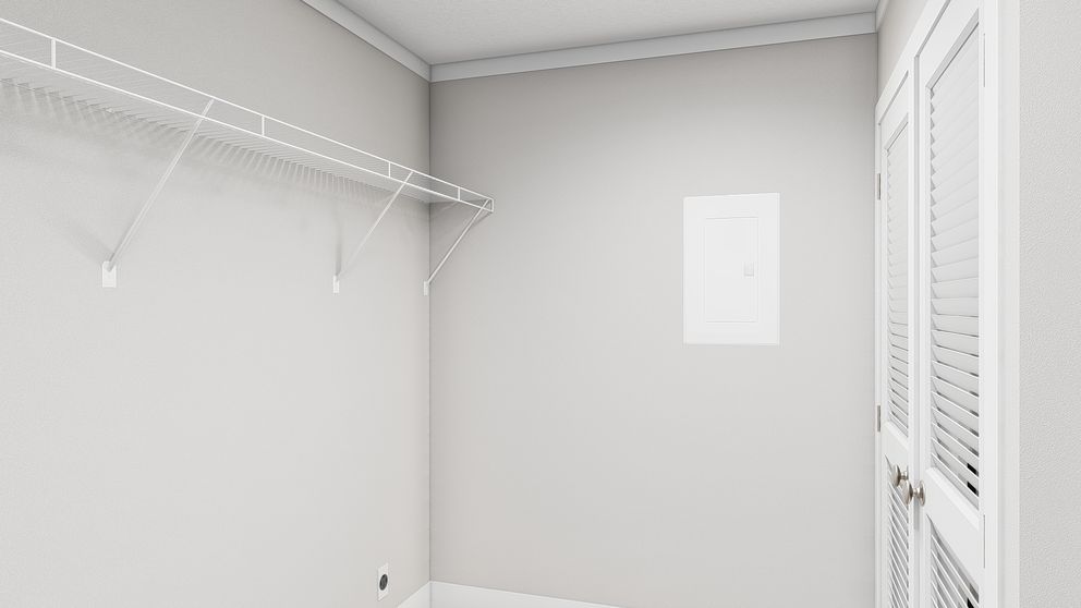 The SHOUT Utility Room. This Manufactured Mobile Home features 3 bedrooms and 2 baths.