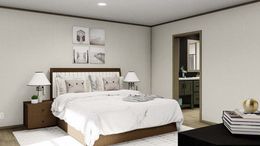 The EVEREST Primary Bedroom. This Manufactured Mobile Home features 4 bedrooms and 2 baths.