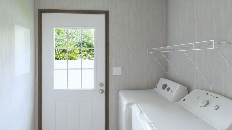 The ULTRA ISLAND BREEZE 56' Utility Room. This Manufactured Mobile Home features 3 bedrooms and 2 baths.