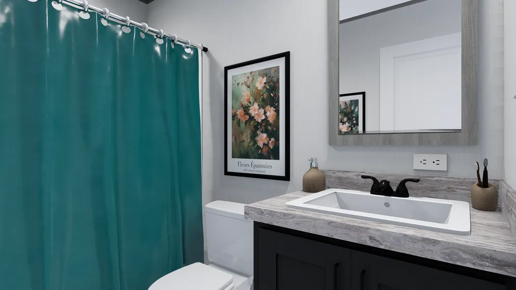 The REV 76 Guest Bathroom. This Manufactured Mobile Home features 3 bedrooms and 2 baths.