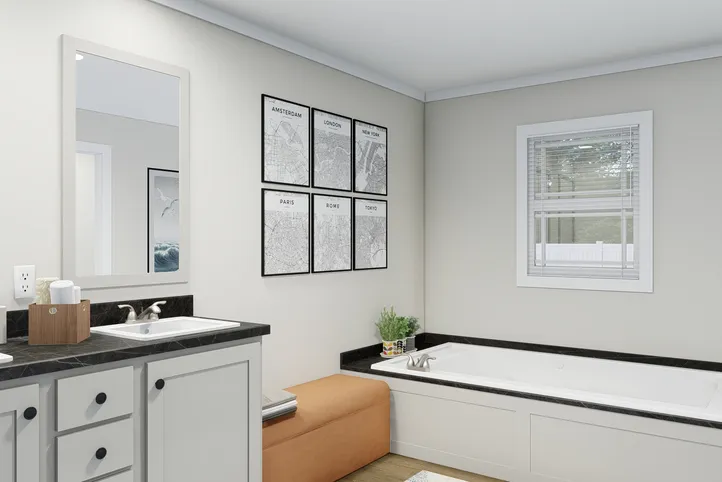 The CLASSIC 60B Primary Bathroom. This Manufactured Mobile Home features 3 bedrooms and 2 baths.