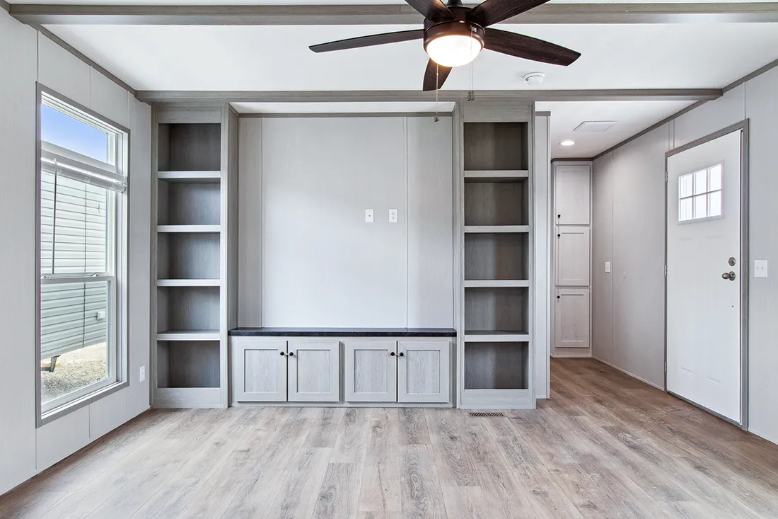 The ANNIVERSARY 16682F Living Room. This Manufactured Mobile Home features 2 bedrooms and 2 baths.