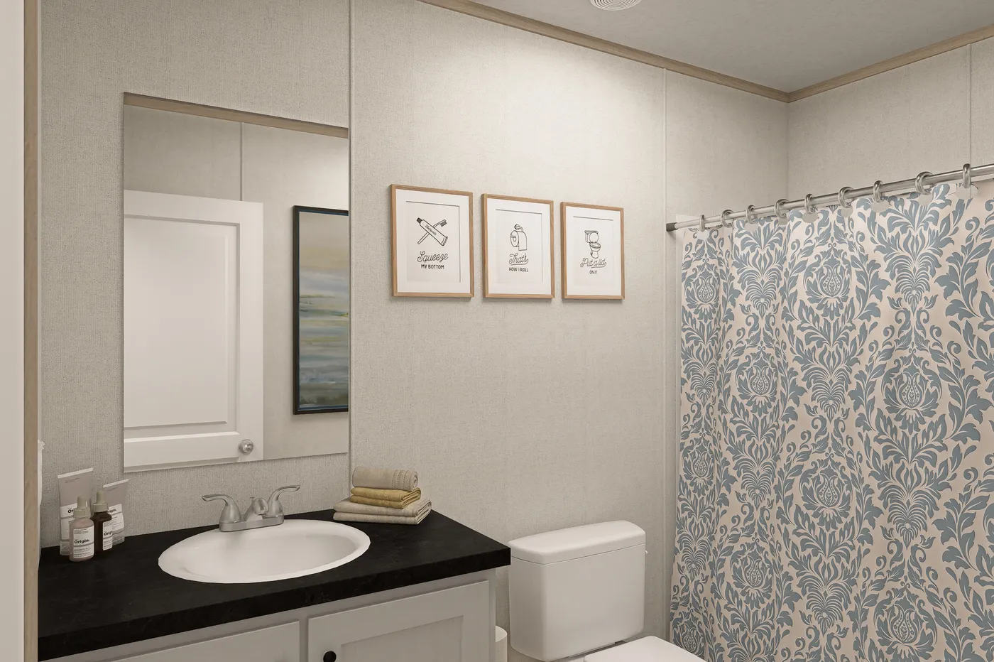 The THE EAGLE 76 Guest Bathroom. This Manufactured Mobile Home features 5 bedrooms and 2 baths.