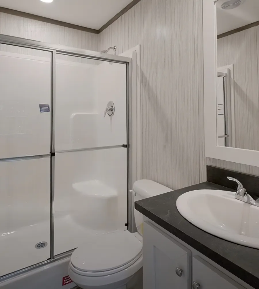 The PERIDOT Guest Bathroom. This Manufactured Mobile Home features 2 bedrooms and 1 bath.