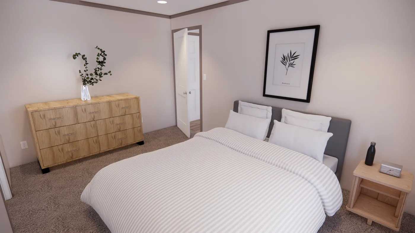 The 6616-4200 ADRENALINE Primary Bedroom. This Manufactured Mobile Home features 3 bedrooms and 2 baths.
