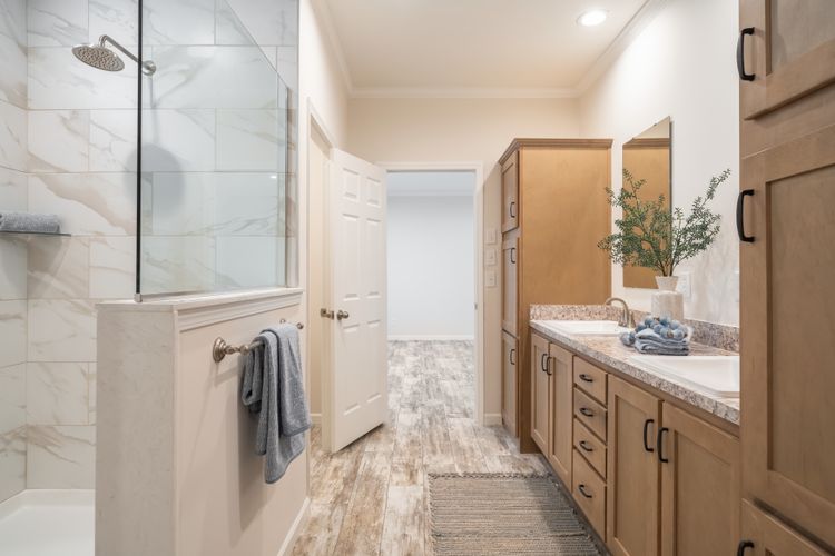 The 2062 CLASSIC Primary Bathroom. This Manufactured Mobile Home features 3 bedrooms and 2 baths.