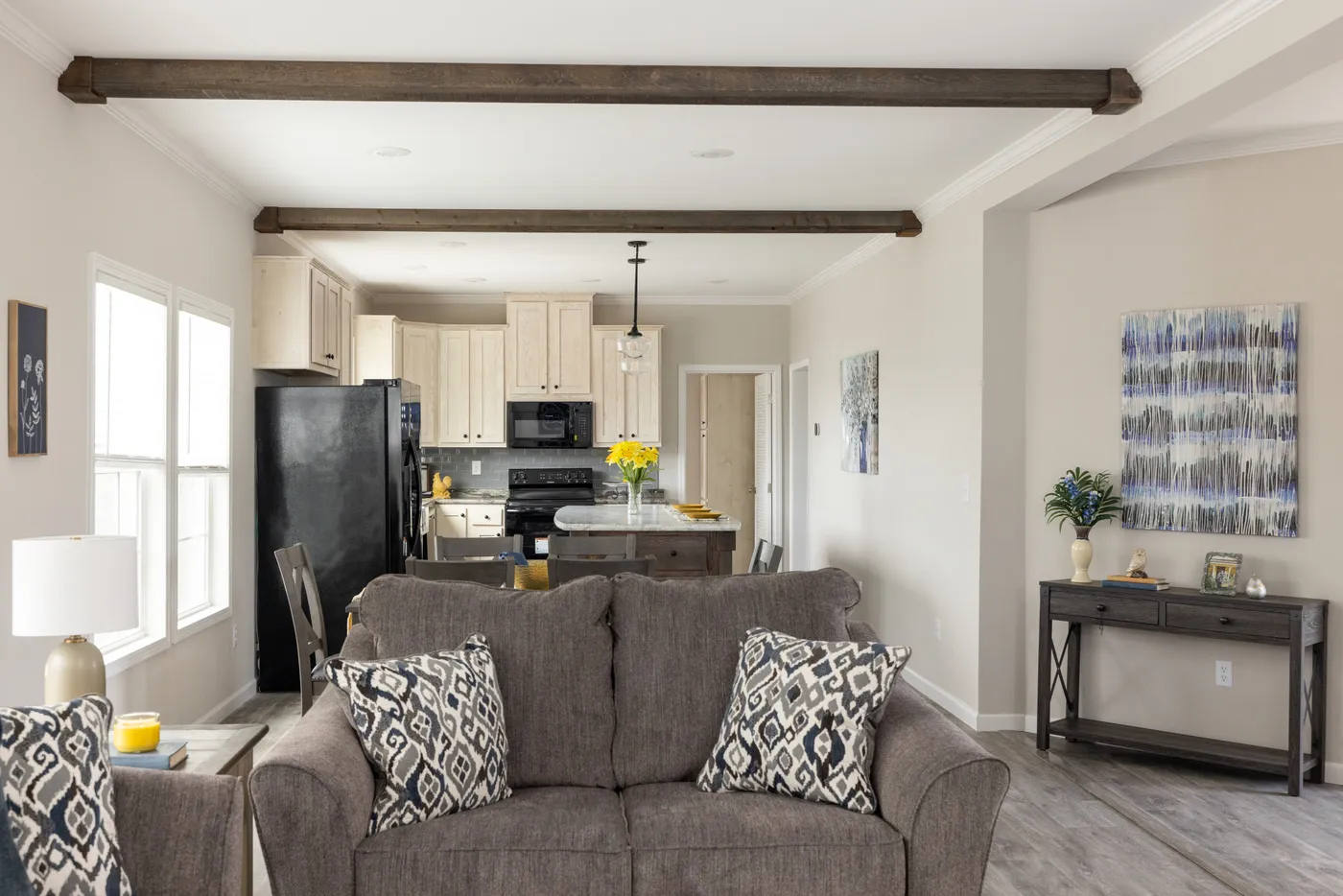 The THE ROGUE Living Room. This Manufactured Mobile Home features 3 bedrooms and 2 baths.