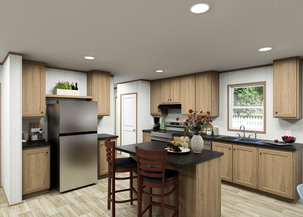 The VISTA Kitchen. This Manufactured Mobile Home features 3 bedrooms and 2 baths.