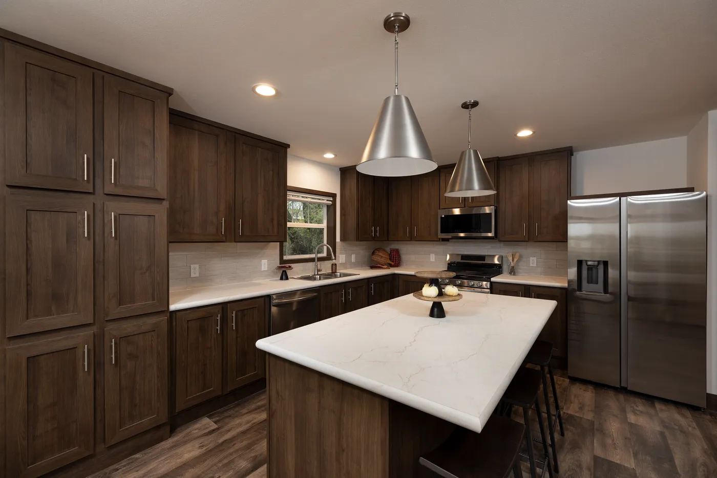 The RAMSEY 75 Kitchen. This Manufactured Mobile Home features 4 bedrooms and 2 baths.