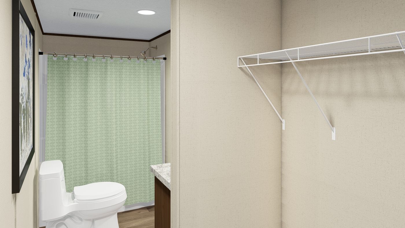 The DELIGHT Primary Bathroom. This Manufactured Mobile Home features 2 bedrooms and 2 baths.