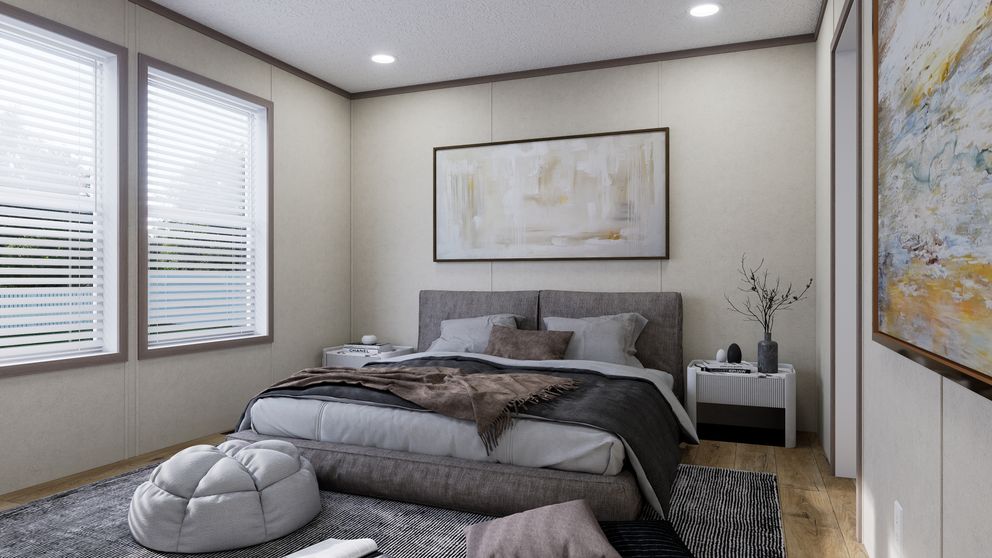 The 5224-CC55 STONEBRIDGE 52 Primary Bedroom. This Manufactured Mobile Home features 3 bedrooms and 2 baths.