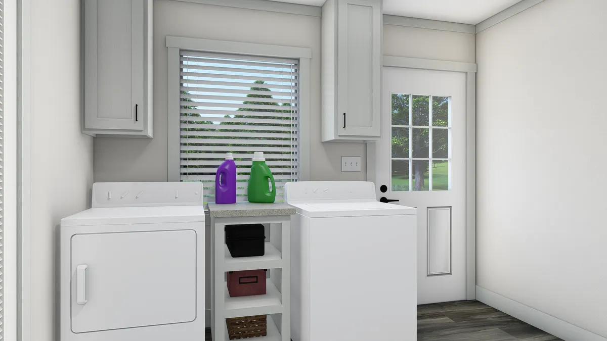 The FARM 3 FLEX ELITE DEN Utility Room. This Manufactured Mobile Home features 3 bedrooms and 2 baths.