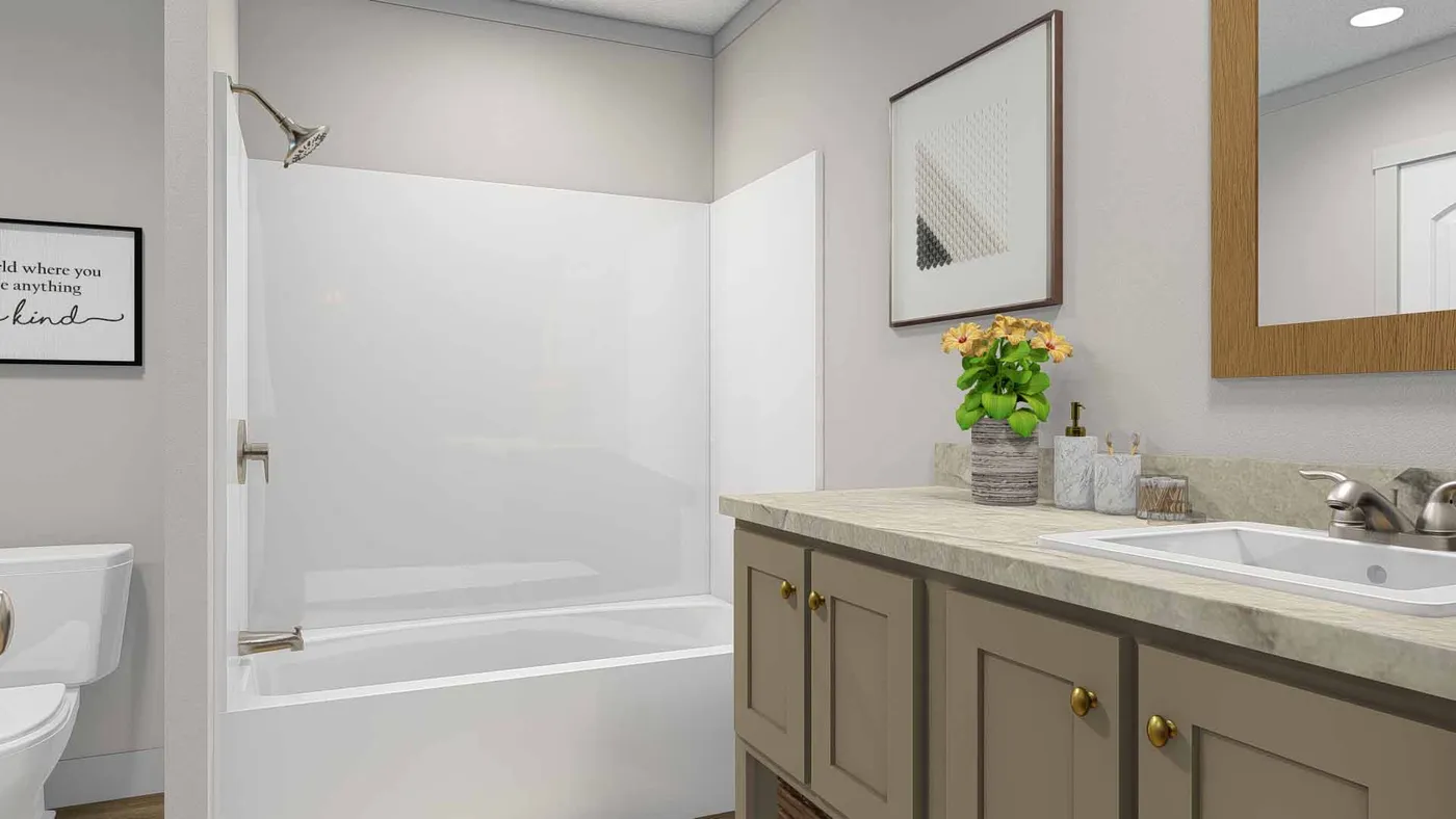 The ROCKET MAN Guest Bathroom. This Manufactured Mobile Home features 3 bedrooms and 2 baths.